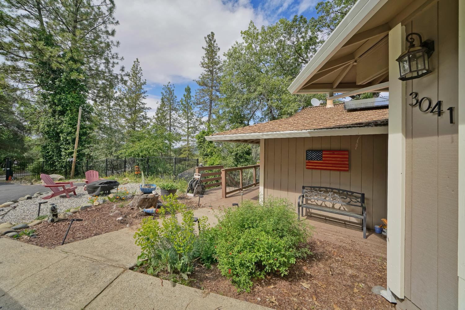 3041 Rising Hill Court Placerville, CA 95667 - Photo 26 of 31 a view of a patio with table and chairs and potted plants