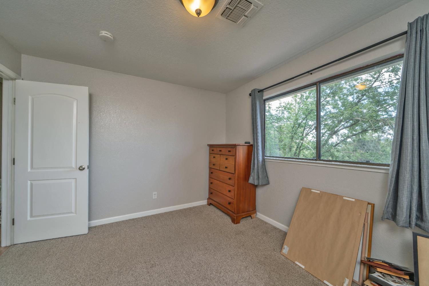 3041 Rising Hill Court Placerville, CA 95667 - Photo 27 of 31 a view of room with furniture and windows