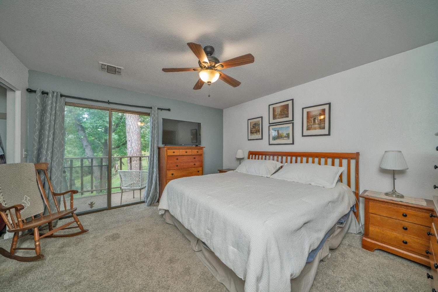 3041 Rising Hill Court Placerville, CA 95667 - Photo 6 of 31 a bedroom with a bed and a dresser next to a window
