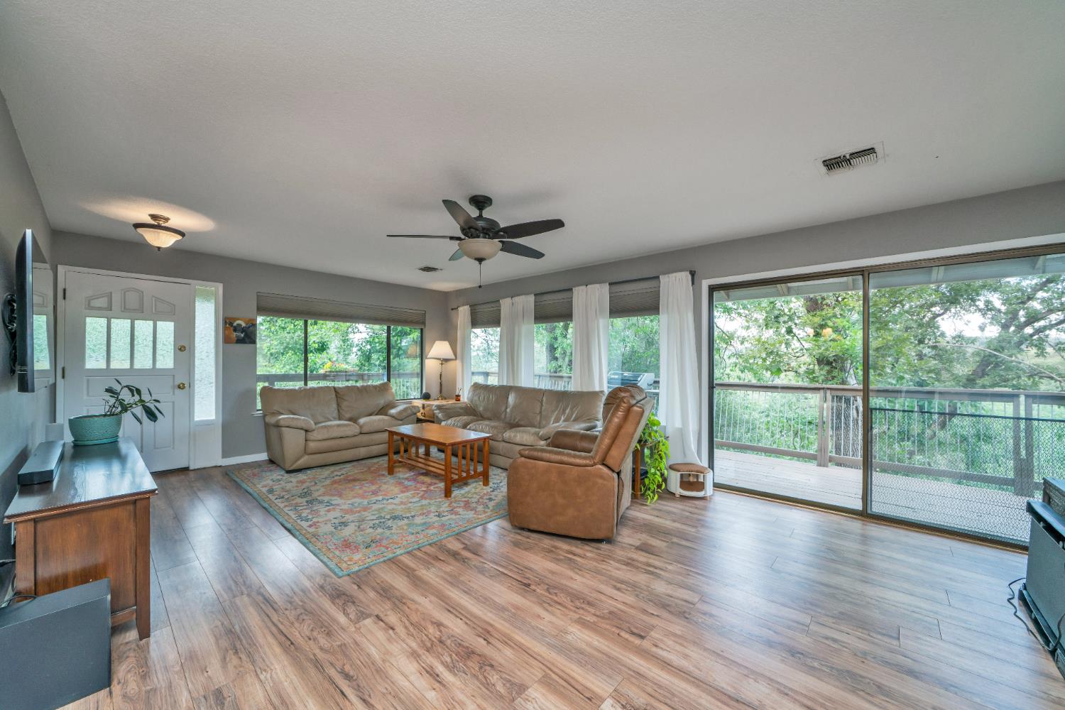 3041 Rising Hill Court Placerville, CA 95667 - Photo 9 of 31 a living room with furniture and a large window