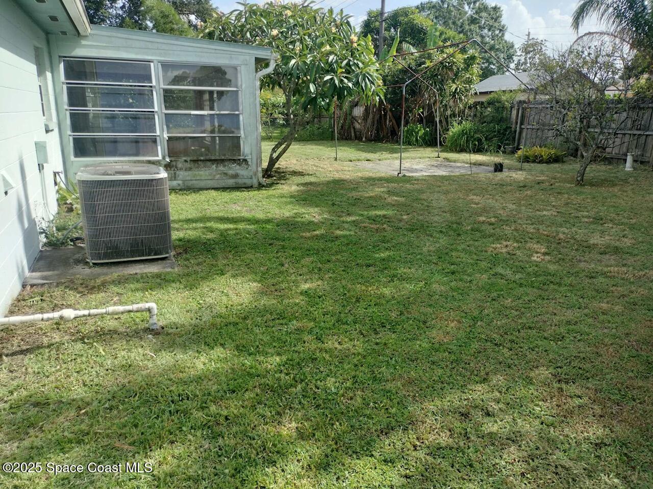 255 Monaco Road Melbourne, FL 32904 - Photo 14 of 17 Backyard view of porch