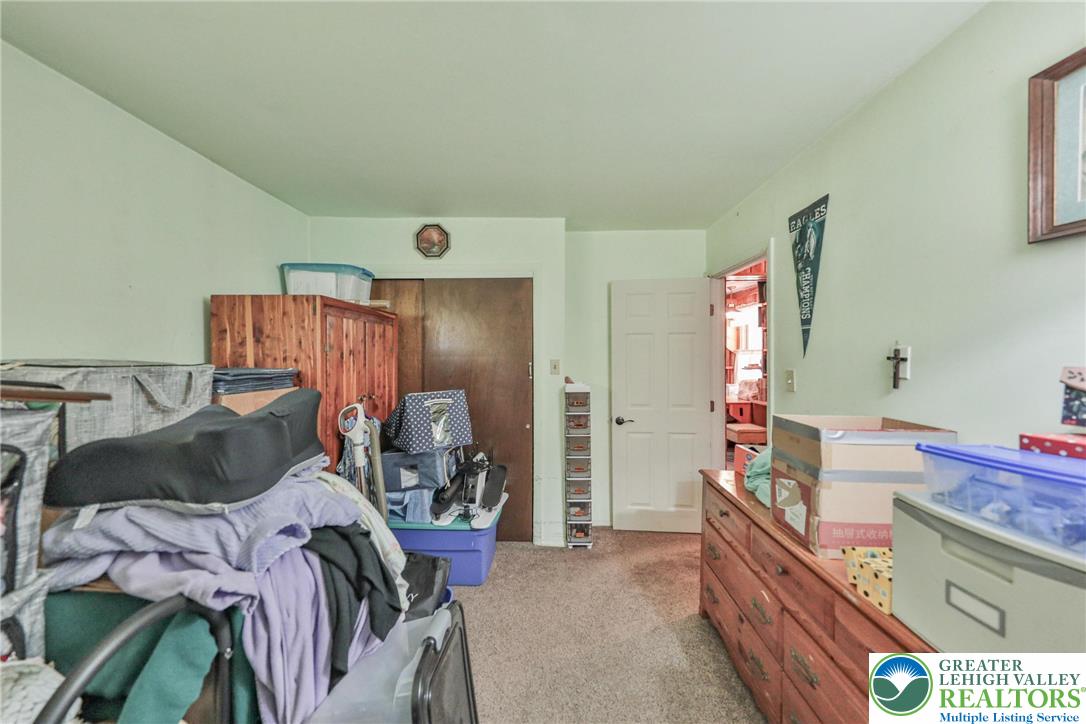 331 Cranberry Creek Road Cresco, PA 18326 - Photo 31 of 95 Functional bedroom featuring a closet and classic wood flooring underfoot.