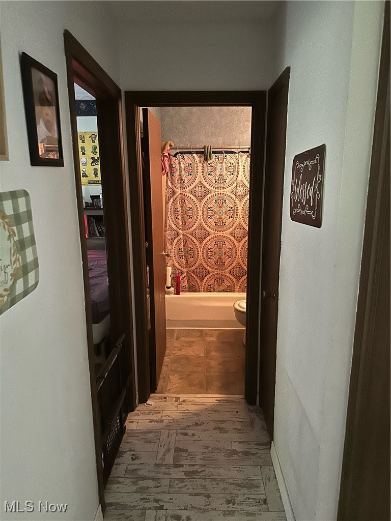 15528 Stoltz Road Diamond, OH 44412 - Photo 12 of 28 Hallway with tile patterned flooring