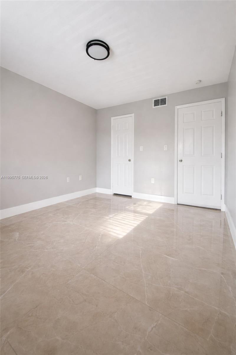 10581 Southwest 155th Court, Unit 1222 Miami, FL 33196 - Photo 13 of 15 a view of empty room