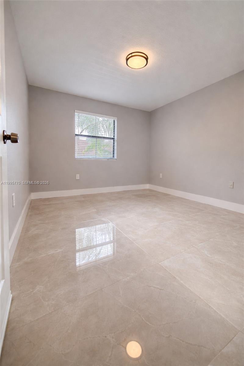 10581 Southwest 155th Court, Unit 1222 Miami, FL 33196 - Photo 10 of 15 a view of empty room