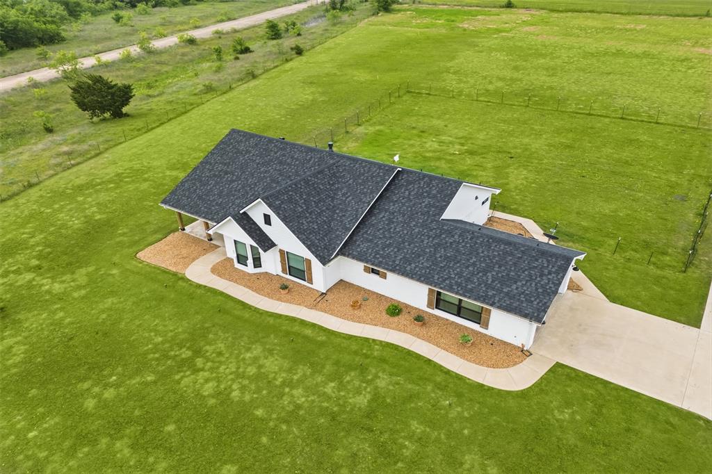 2990 Wilson Road Palmer, TX 75152 - Photo 6 of 40 an aerial view of a house with a garden
