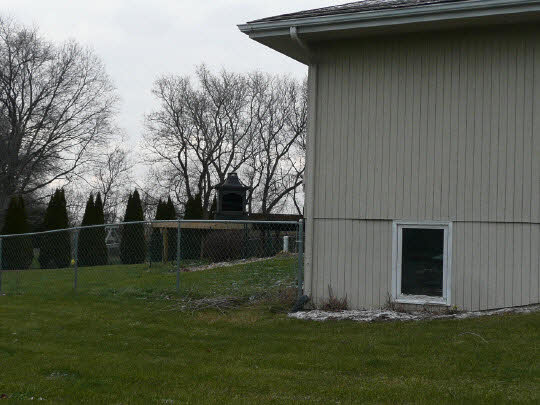 5712 Gray Eagle Road Roscoe, IL 61073 - Photo 2 of 10 a backyard of a house with lots of green space