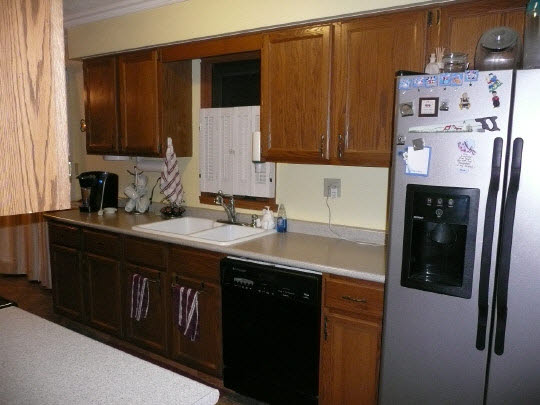 5712 Gray Eagle Road Roscoe, IL 61073 - Photo 5 of 10 a kitchen with a sink and cabinets