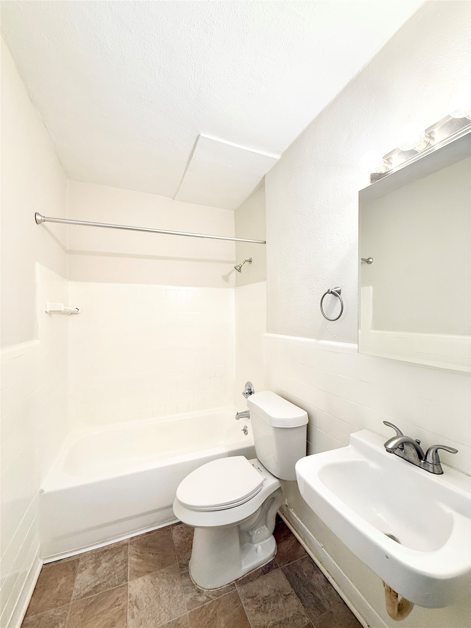 2717 Hadley Street, Unit 16 Houston, TX 77004 - Photo 13 of 27 a bathroom with a toilet sink and shower
