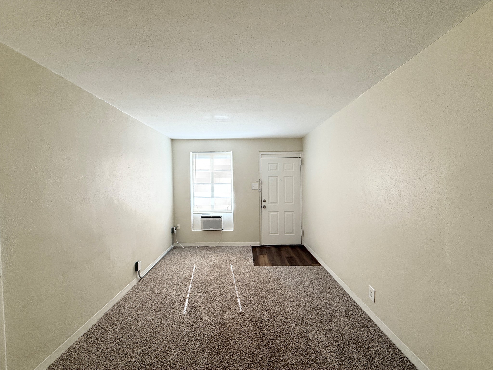 2717 Hadley Street, Unit 16 Houston, TX 77004 - Photo 4 of 27 a view of an empty room with a window