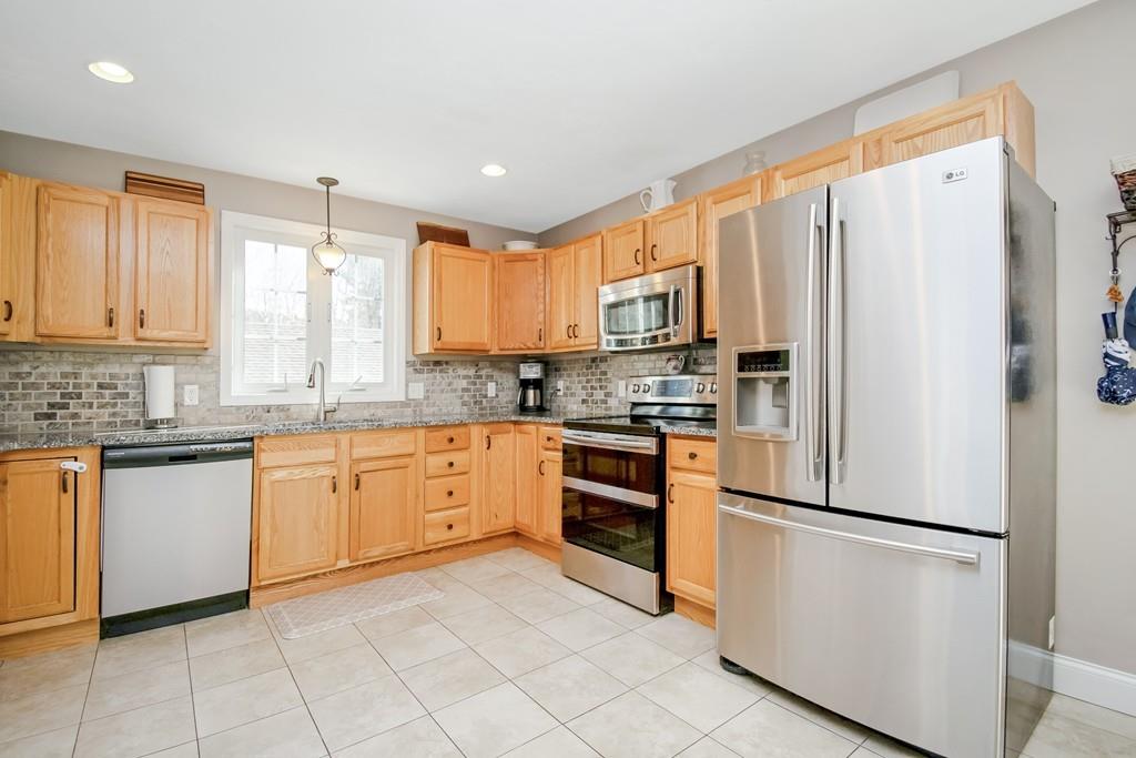 602 Southbridge Road Warren, MA 01083 - Photo 18 of 42 a kitchen with stainless steel appliances granite countertop a refrigerator sink and cabinets