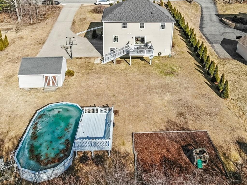 602 Southbridge Road Warren, MA 01083 - Photo 3 of 42 an aerial view of a house with swimming pool