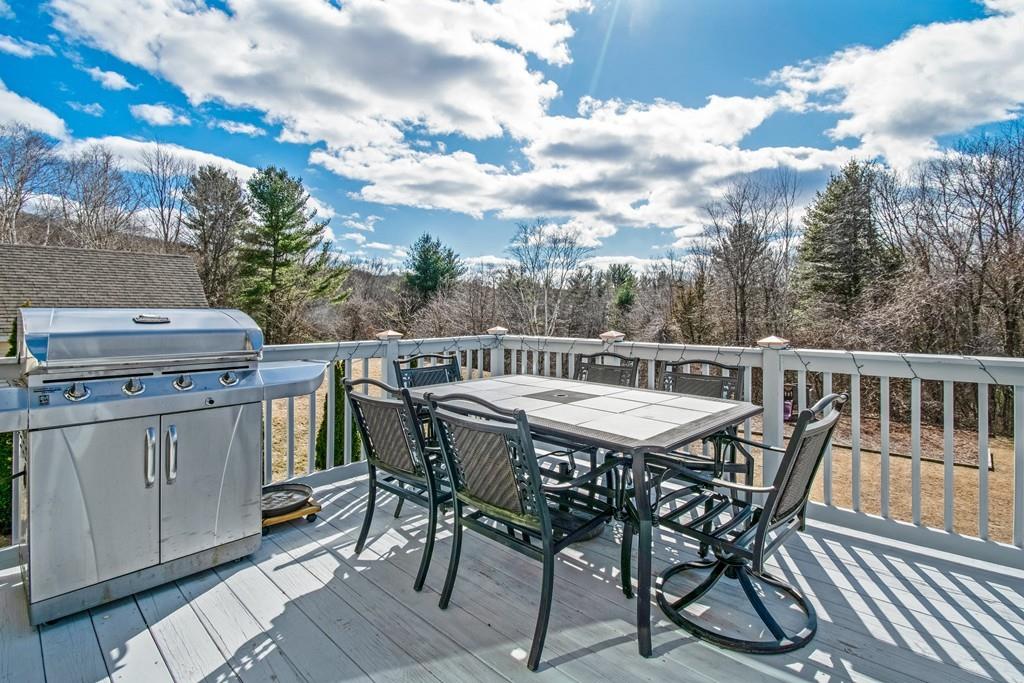 602 Southbridge Road Warren, MA 01083 - Photo 4 of 42 a view of a chairs and table on the roof deck