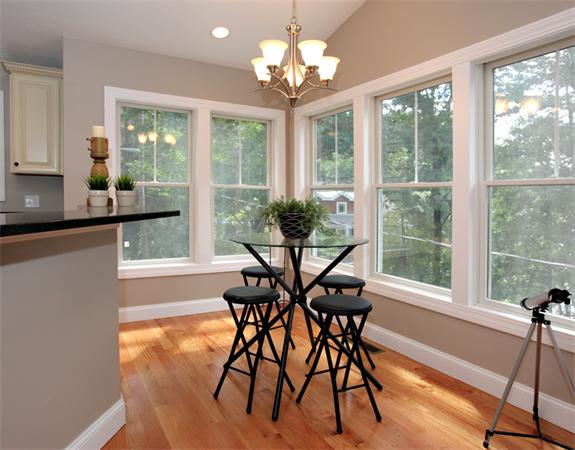7 Lake Road Wellesley, MA 02482 - Photo 9 of 24 a view of a dining room with furniture window and outside view