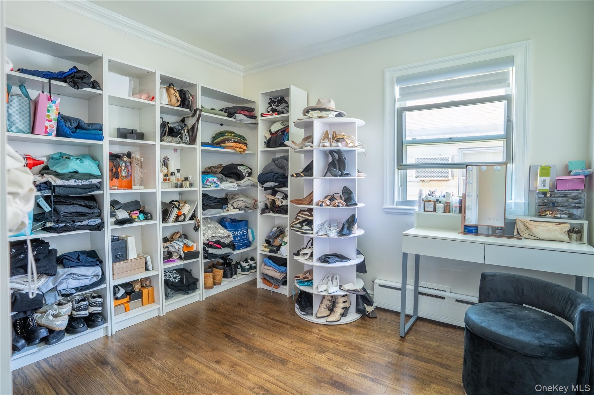 222-36 41st Road Queens, NY 11361 - Photo 13 of 21 a view of a workspace with furniture and a window