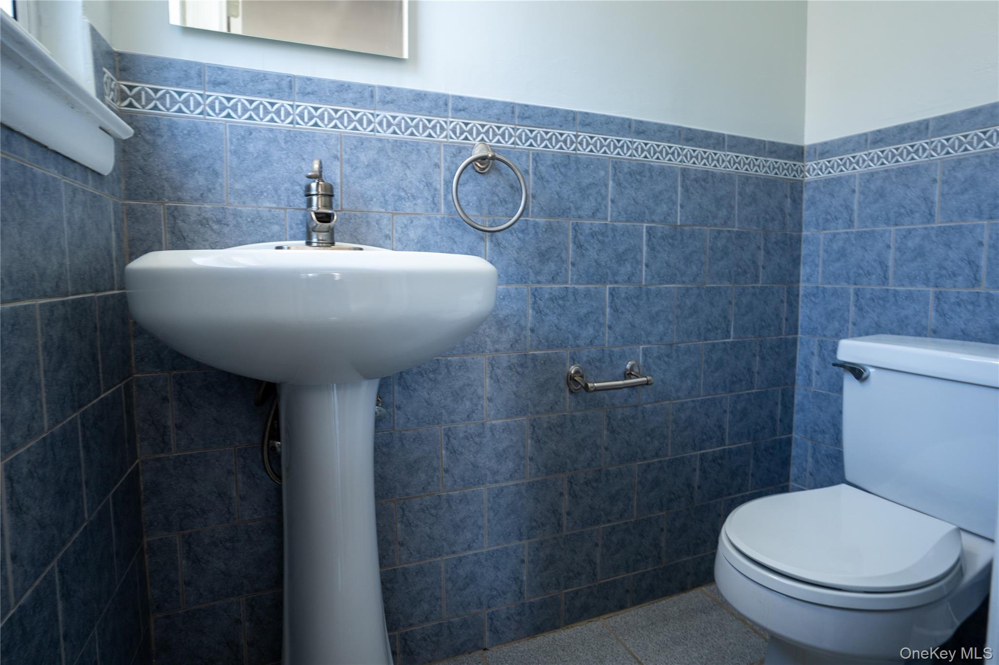 222-36 41st Road Queens, NY 11361 - Photo 14 of 21 a bathroom with a sink toilet and shower