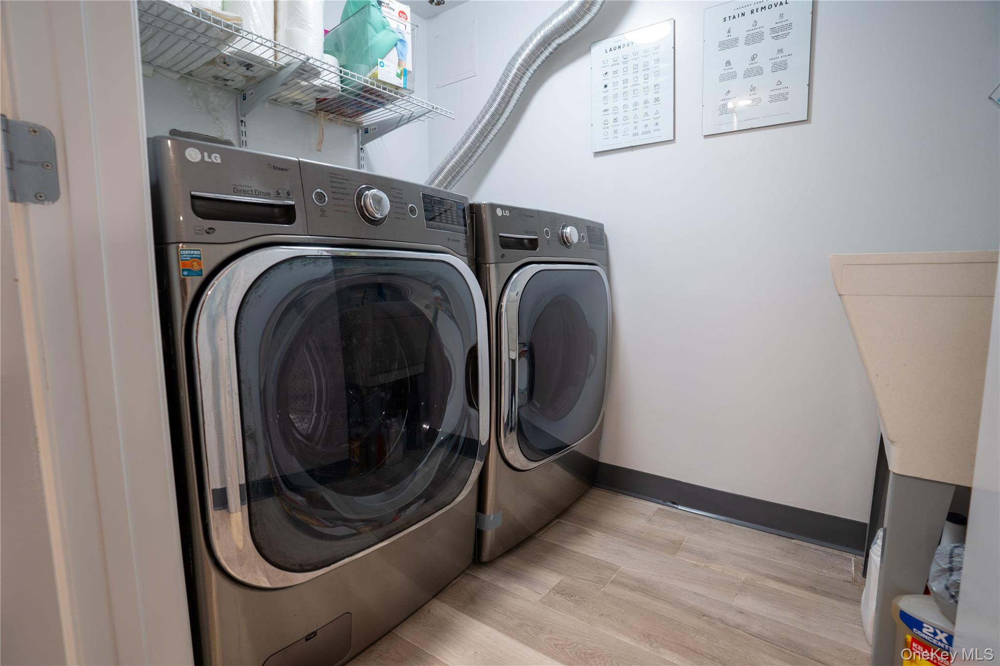 222-36 41st Road Queens, NY 11361 - Photo 17 of 21 a utility room with dryer and washer