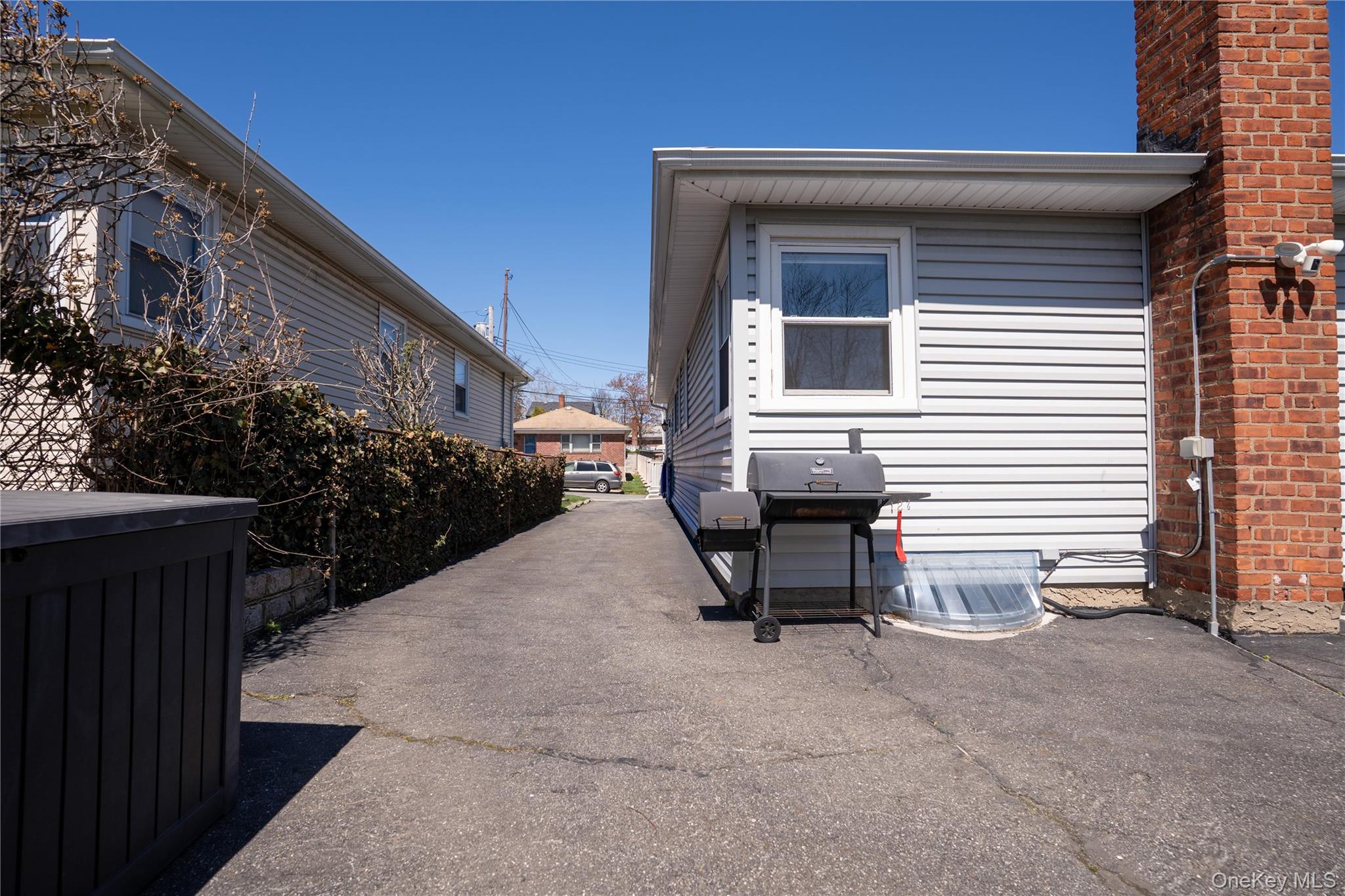 222-36 41st Road Queens, NY 11361 - Photo 20 of 21 a view of a house with backyard and sitting area