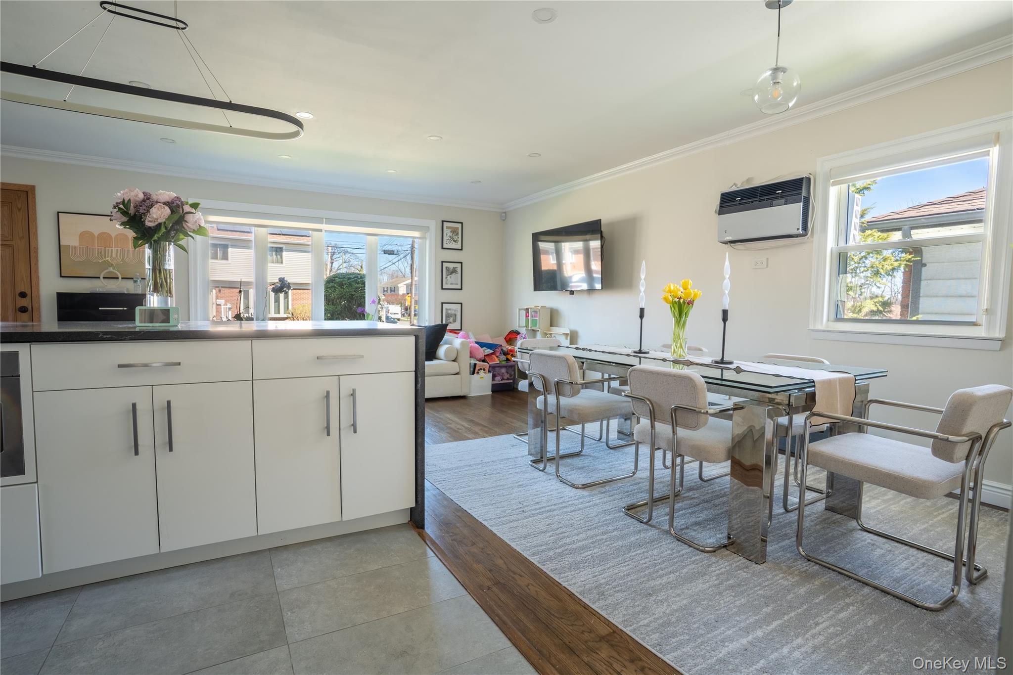222-36 41st Road Queens, NY 11361 - Photo 4 of 21 a view of a dining room with furniture and a window