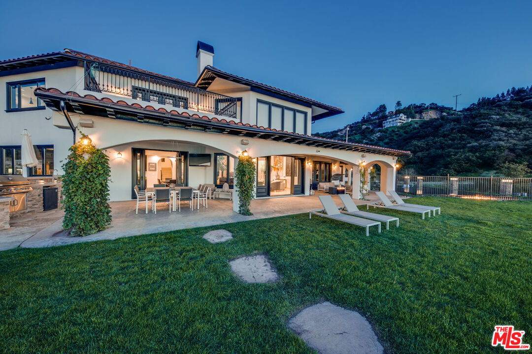 24573 Piuma Road Malibu, CA 90265 - Photo 28 of 30 front view of house with a yard