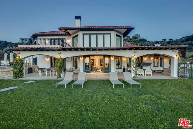 a view of ocean and mountain