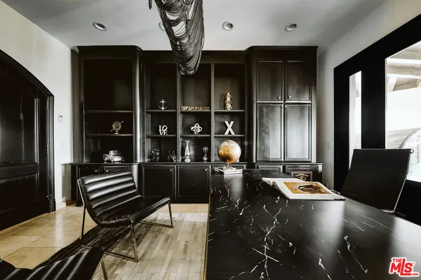 a kitchen with counter top space and stainless steel appliances