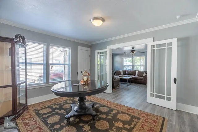 a living room with furniture and a table