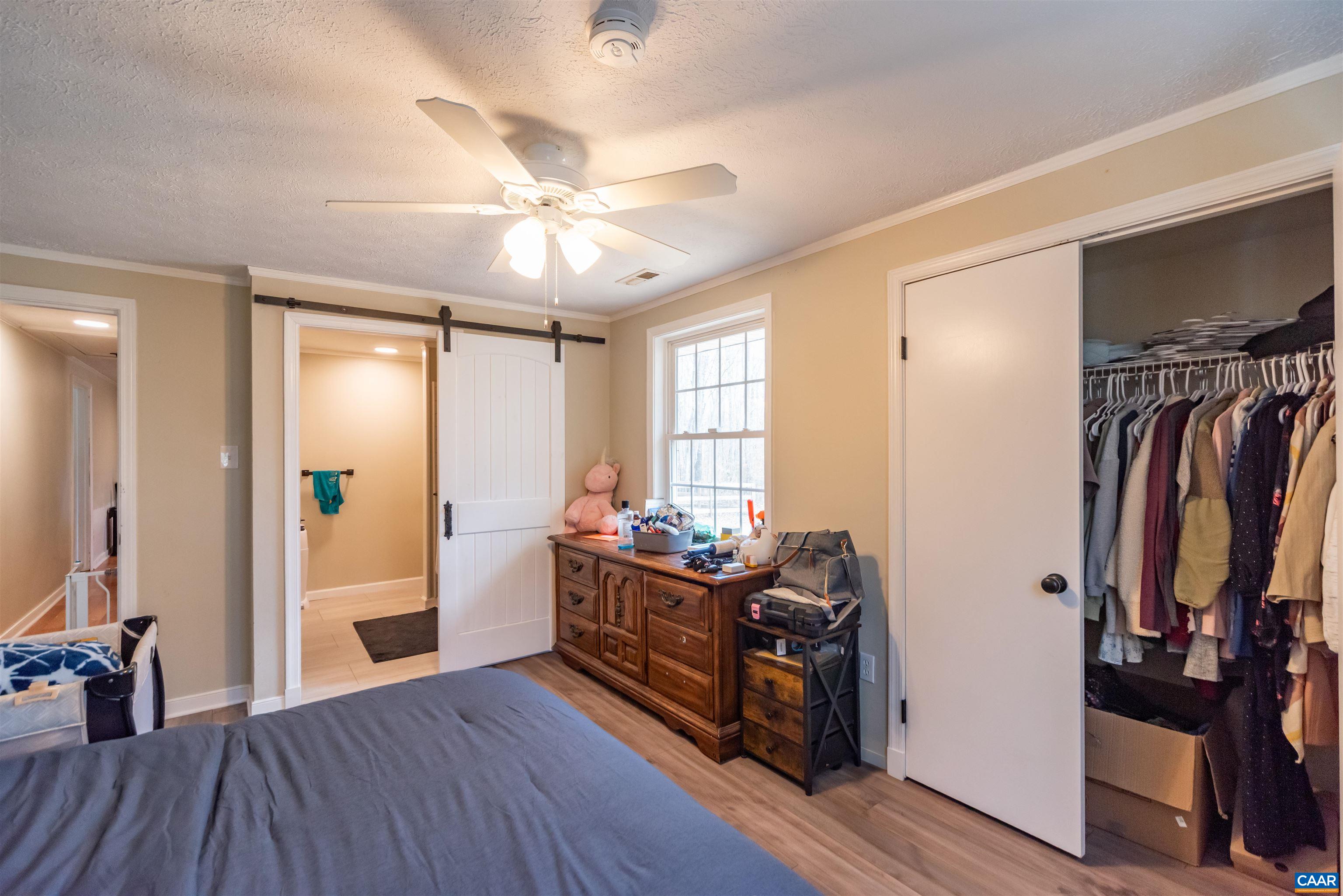 950 Apple Grove Road Mineral, VA 23117 - Photo 19 of 37 a view of a workspace with wooden floor and furniture