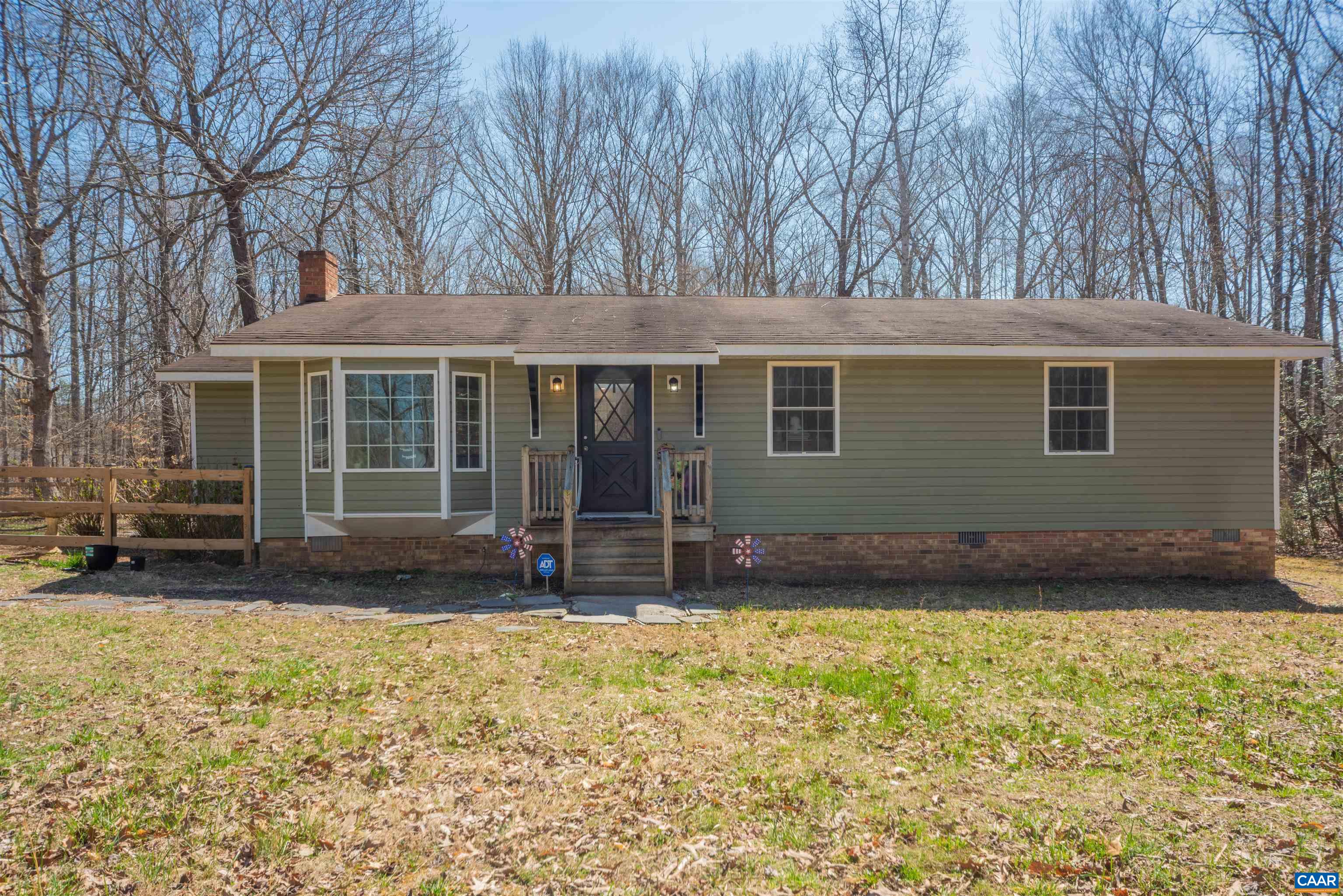 950 Apple Grove Road Mineral, VA 23117 - Photo 2 of 37 a house with trees in the background