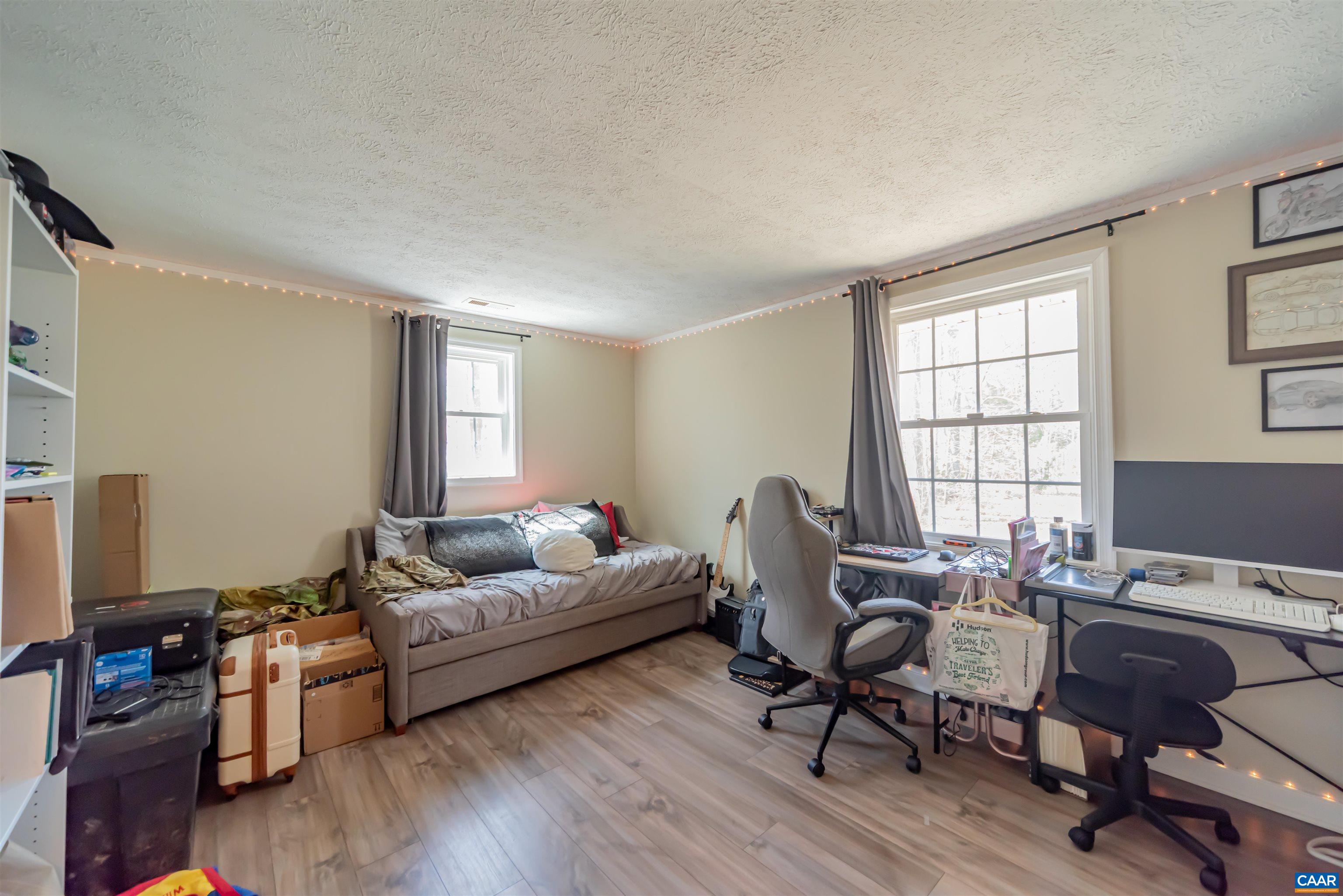 950 Apple Grove Road Mineral, VA 23117 - Photo 21 of 37 a living room with furniture and a wooden floor