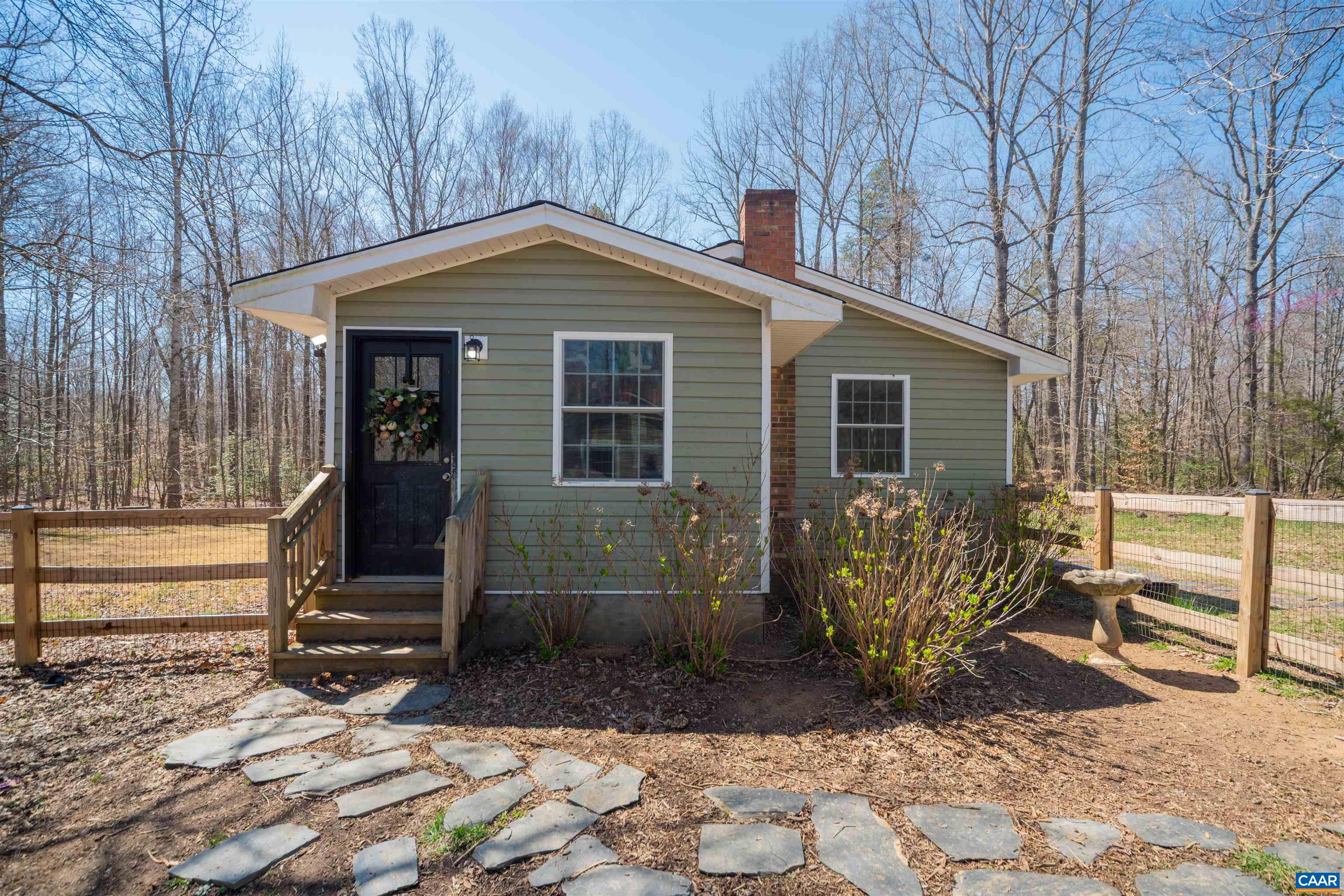 950 Apple Grove Road Mineral, VA 23117 - Photo 26 of 37 a front view of a house with garden