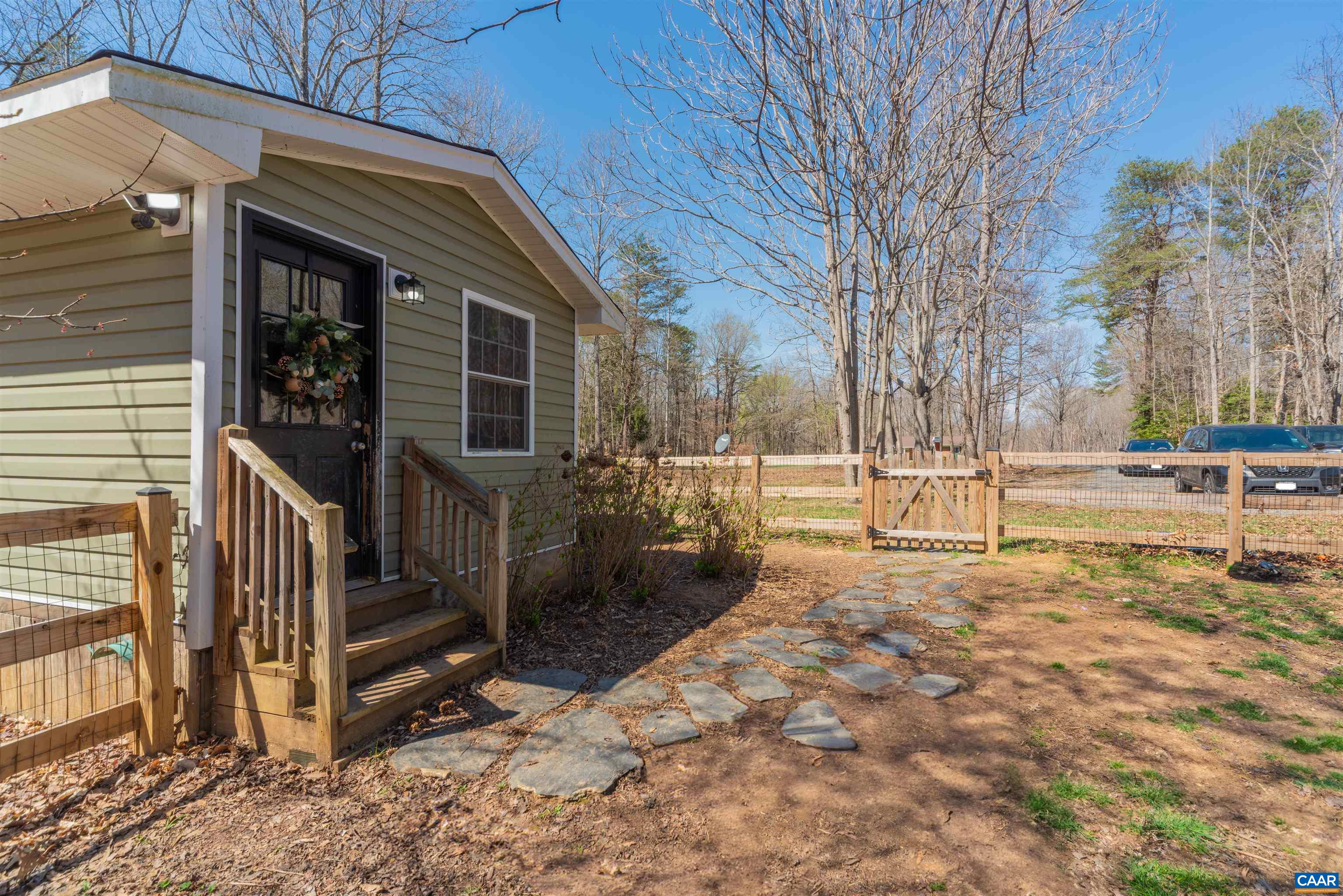 950 Apple Grove Road Mineral, VA 23117 - Photo 27 of 37 a view of a building with wooden fence