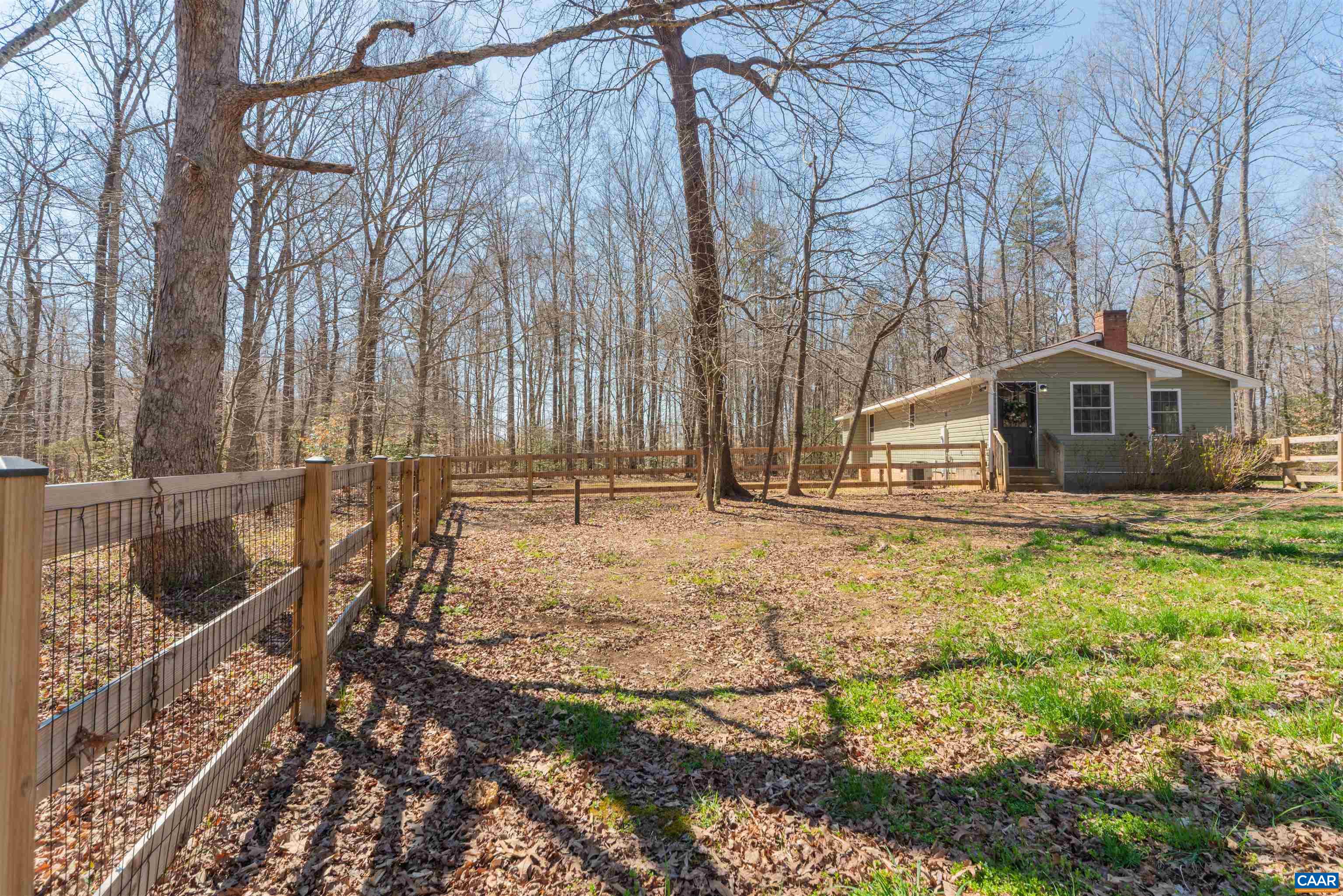 950 Apple Grove Road Mineral, VA 23117 - Photo 29 of 37 a view of house with backyard and trees
