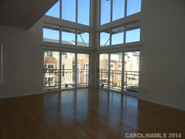 608 Raphael Place, Unit 608 Charlotte, NC 28205 - Photo 2 of 14 a view of an entryway with wooden floor