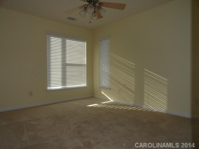 608 Raphael Place, Unit 608 Charlotte, NC 28205 - Photo 11 of 14 a view of empty room with a window