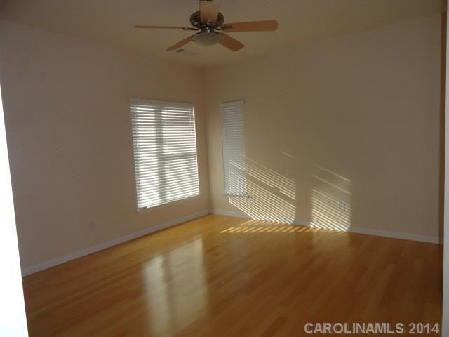 608 Raphael Place, Unit 608 Charlotte, NC 28205 - Photo 9 of 14 a view of an empty room and window