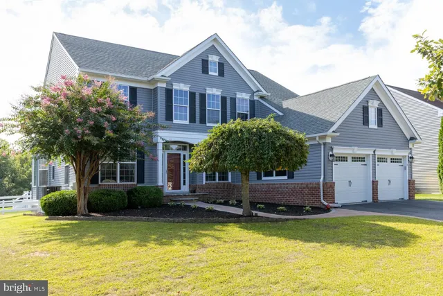 a front view of a house with swimming pool