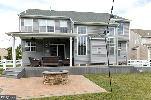 a front view of a house with swimming pool