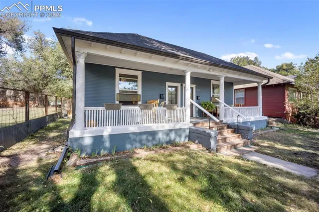 a front view of a house with swimming pool