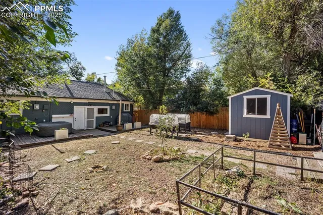 a house with trees in the background
