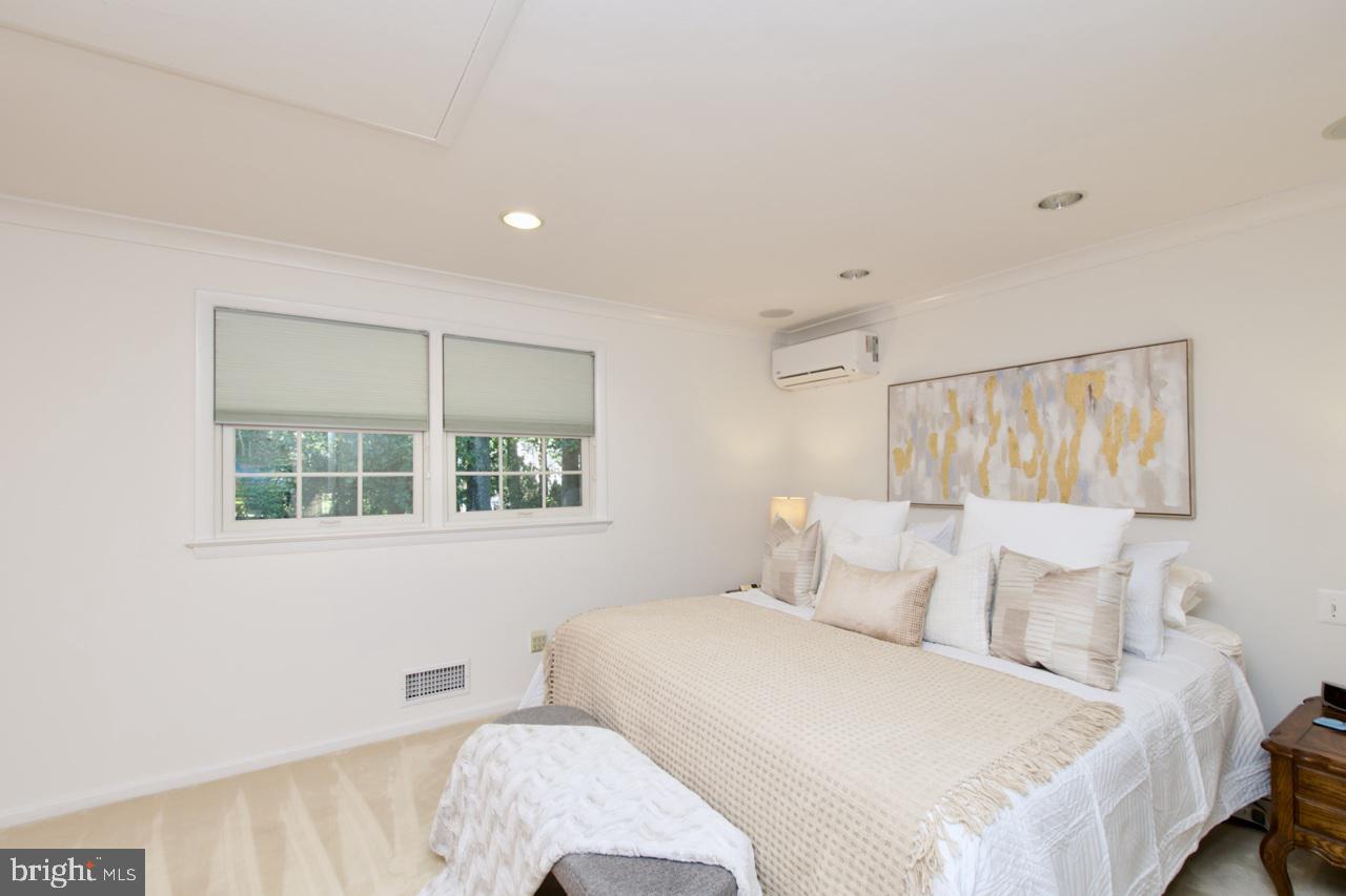 6613 Kerns Road Falls Church, VA 22042 - Photo 15 of 48 a bedroom with a bed and a window