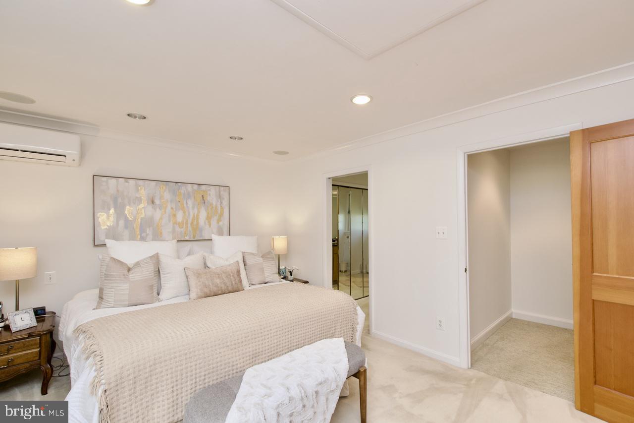 6613 Kerns Road Falls Church, VA 22042 - Photo 17 of 48 a bedroom with a bed and a painting