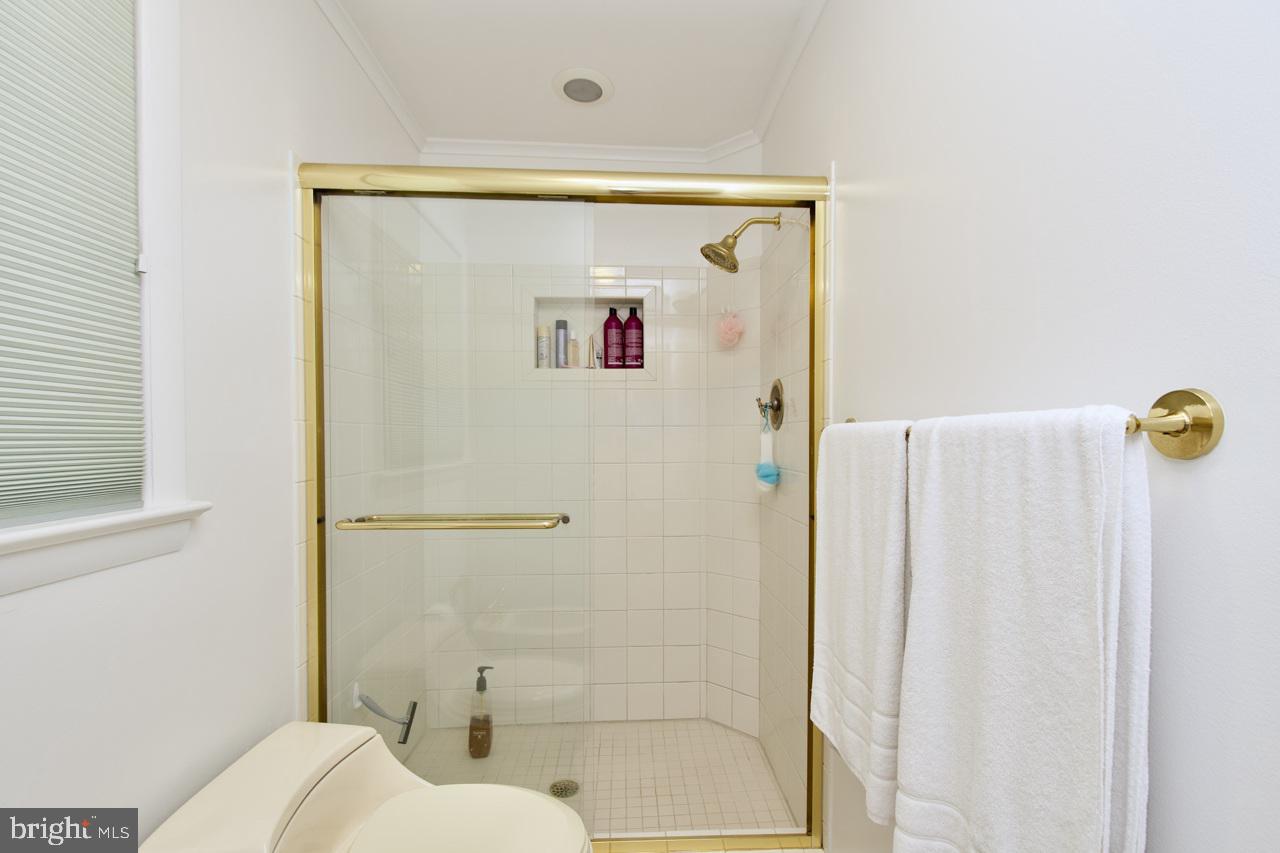 6613 Kerns Road Falls Church, VA 22042 - Photo 20 of 48 a bathroom with a shower and a toilet
