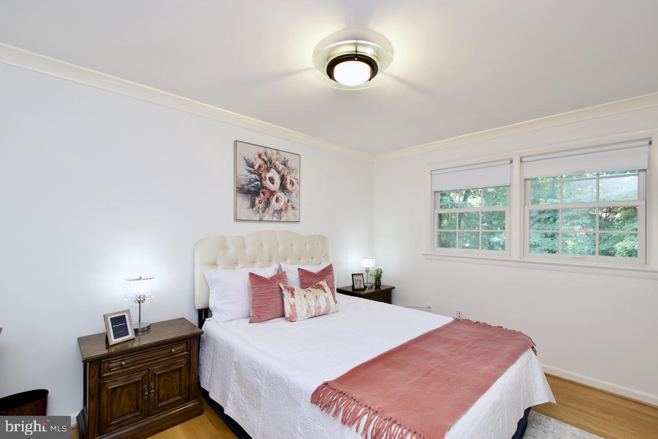 6613 Kerns Road Falls Church, VA 22042 - Photo 24 of 48 a bedroom with a bed and a window