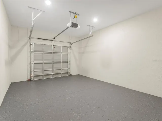 a view of room that has a white walls