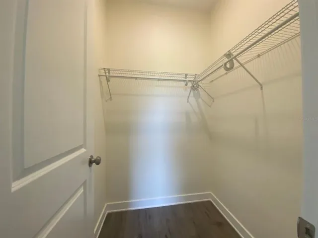 a view of an empty walk in closet