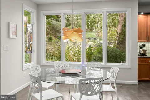 a view of living room with furniture and flat screen tv