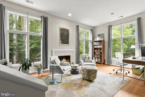 a bathroom with a granite countertop sink mirror and shower