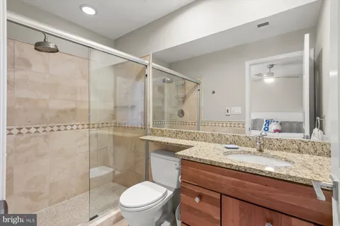 a front view of a house with a yard and outdoor seating