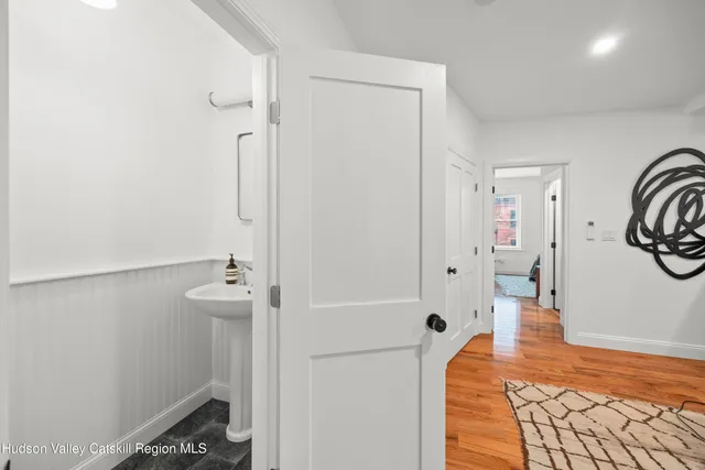 a bathroom with a bathtub and shower